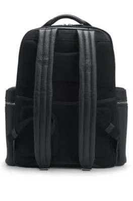 Multi-pocket backpack in Italian leather with signature trims